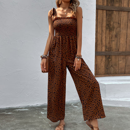 Gepunkteter Jumpsuit mit weitem Bein und Taschen