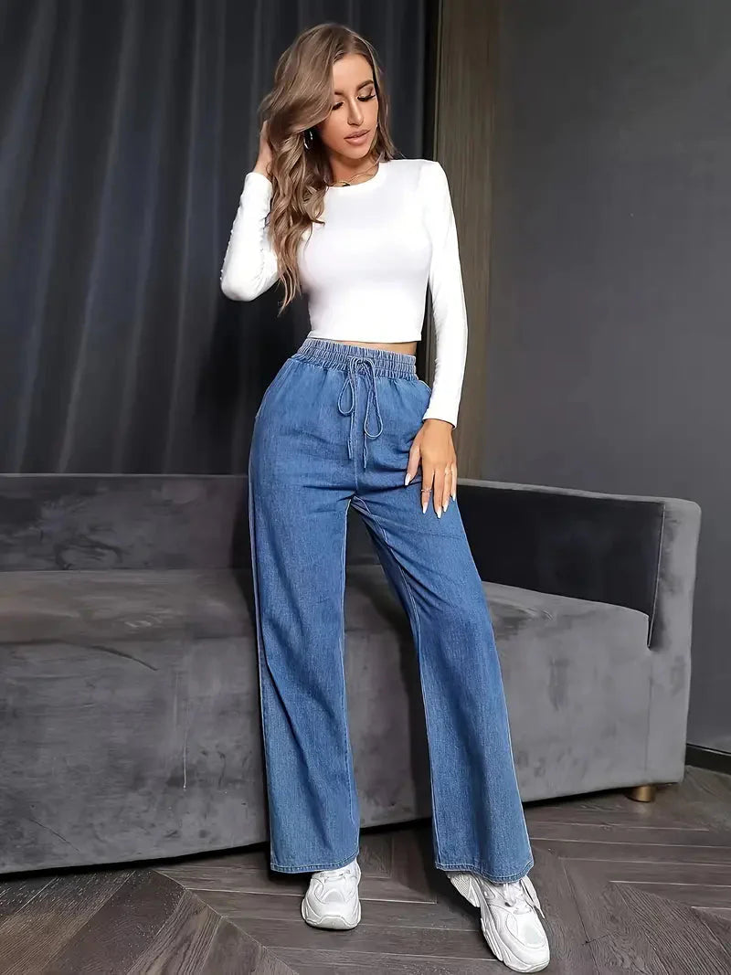 High-Waisted Flared Jeans mit Blumenstickerei für Damen