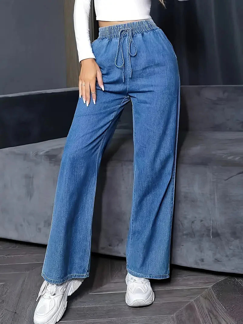 High-Waisted Flared Jeans mit Blumenstickerei für Damen