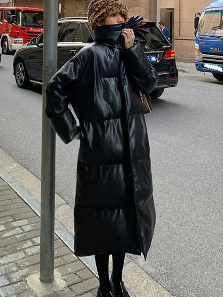 Luxuriöse lange Pufferjacke mit Gürtel für den perfekten Winterlook